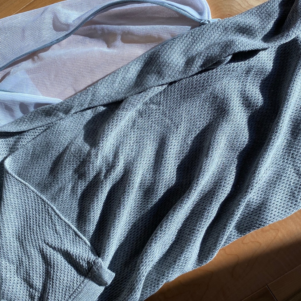 We are AMMA Grey Cocoon cover